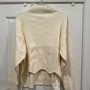 Oddi Wavy Hem Turtleneck Sweater